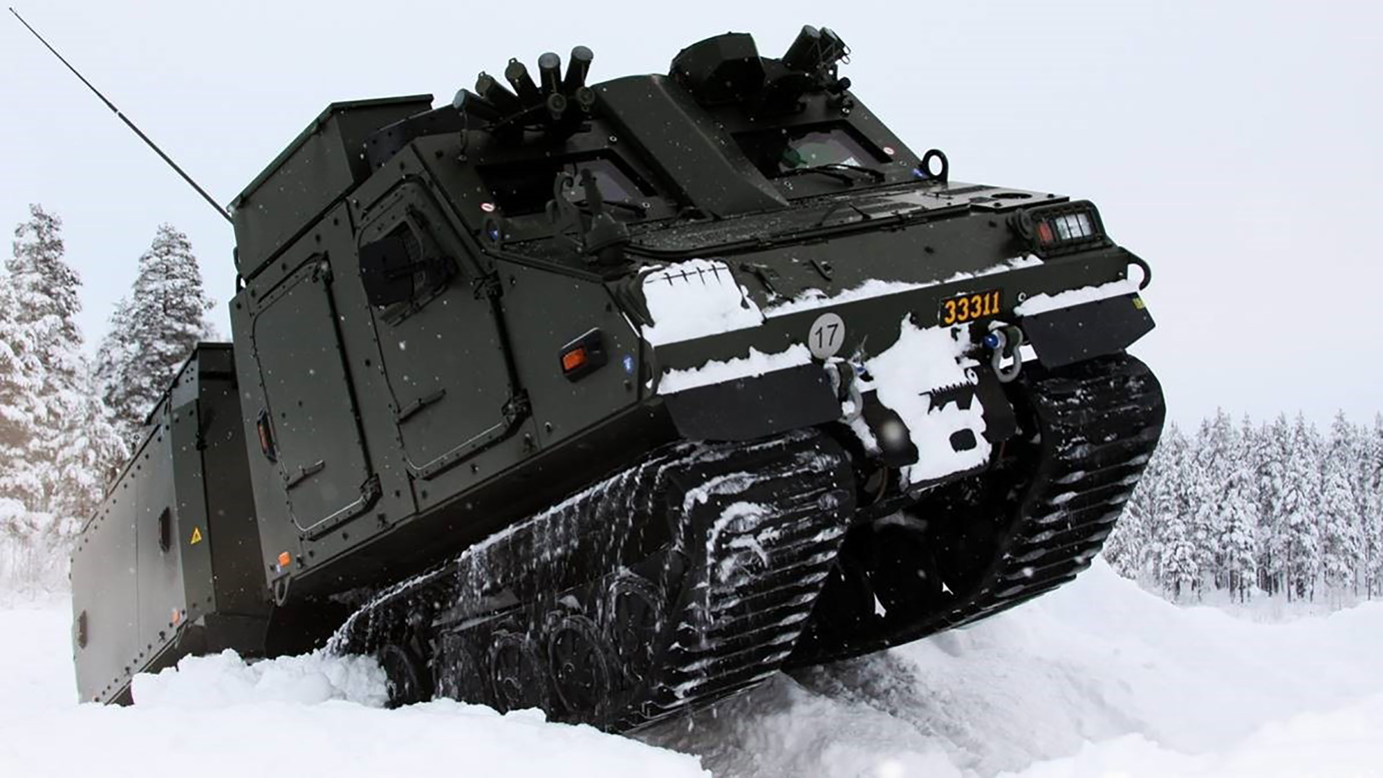 Bandvagn 410 i vintermiljö
